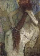 Edgar Degas The woman doing up her hair oil on canvas